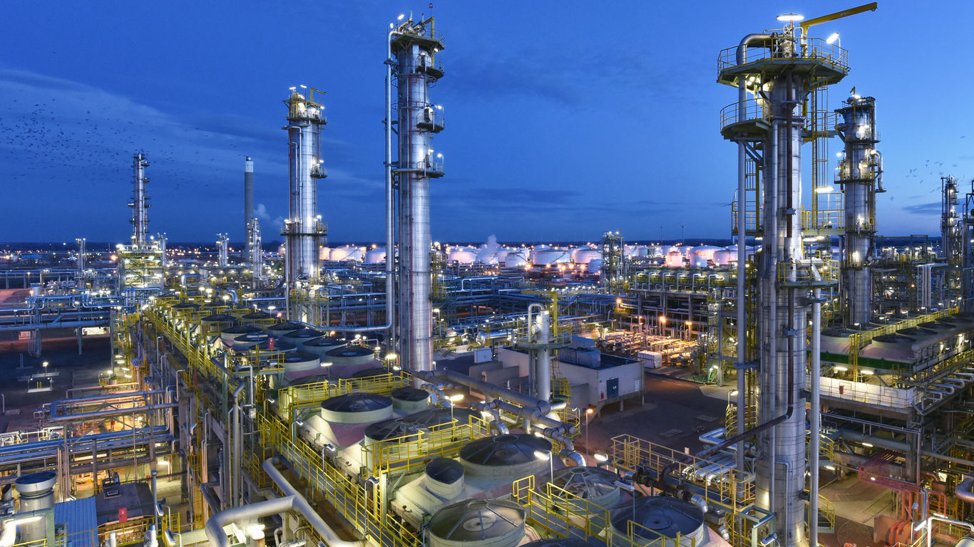 refinery - chemical factory at night with buildings
